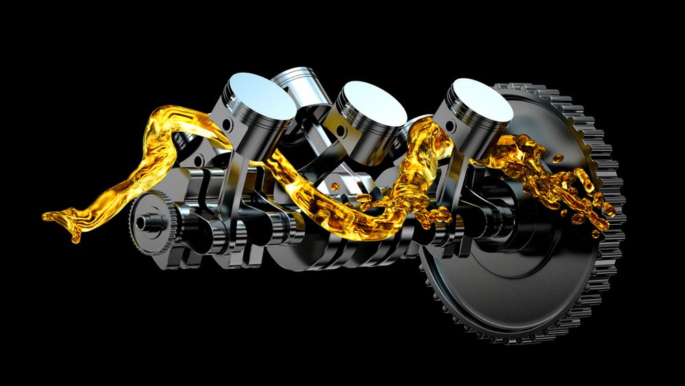 Digital illustration of a car engine's crankshaft and pistons with dynamic liquid gold lubricant flowing around, symbolizing engine performance and efficiency.