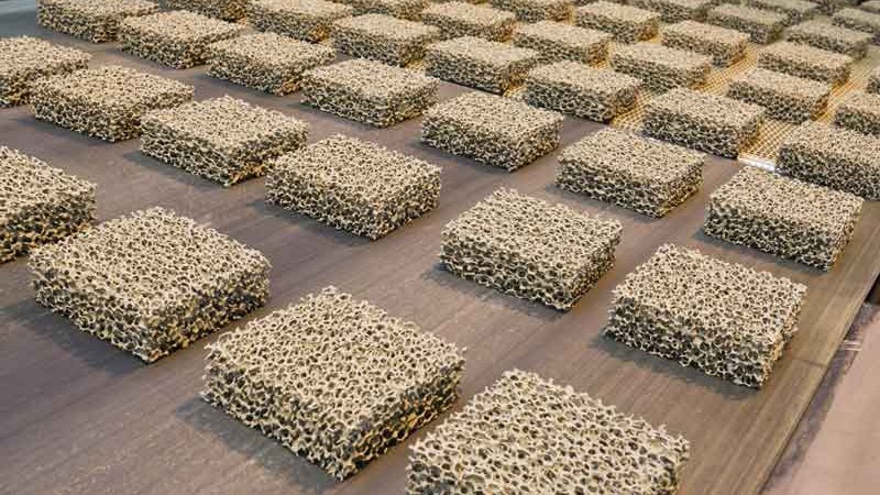 An array of ceramic foam filters on a production line, ready for use in steel casting processes