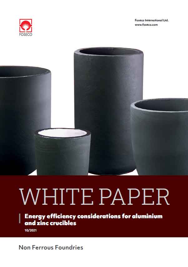 A selection of black cylindrical crucibles on a white background, as featured in Foseco's white paper on energy efficiency for aluminum and zinc foundries